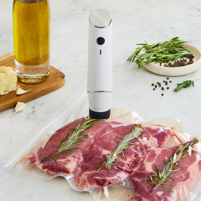 Machine sous vide compacte avec sacs réutilisables et clips