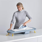 Table à repasser pliante compacte, cadre acier, 89 x 33 cm