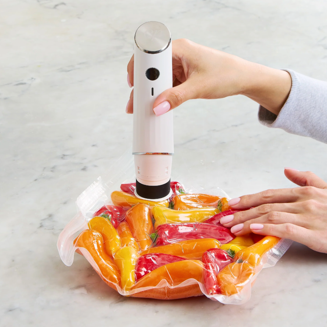 Machine sous vide compacte avec sacs réutilisables et clips