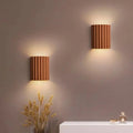 Applique murale LED en résine, format compact 16,5 x 14 x 8 cm, orange