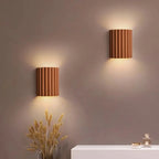 Applique murale LED en résine, format compact 16,5 x 14 x 8 cm, orange