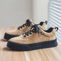 Baskets homme à perforations décoratives, semelle robuste, beige