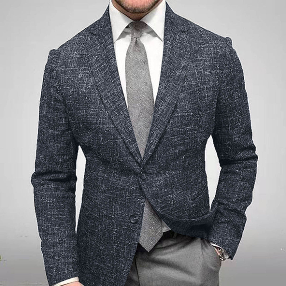Blazer homme deux boutons, revers cranté, uni ou à carreaux, noir à carreaux