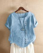 Blouse femme à manches courtes, col rond et devant boutonné, bleu ciel