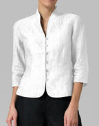 Blouse femme à col montant, manches 3/4 et boutonnage devant, blanc