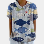 Blouse femme à fleurs pastel, col rond et manches courtes, bleu