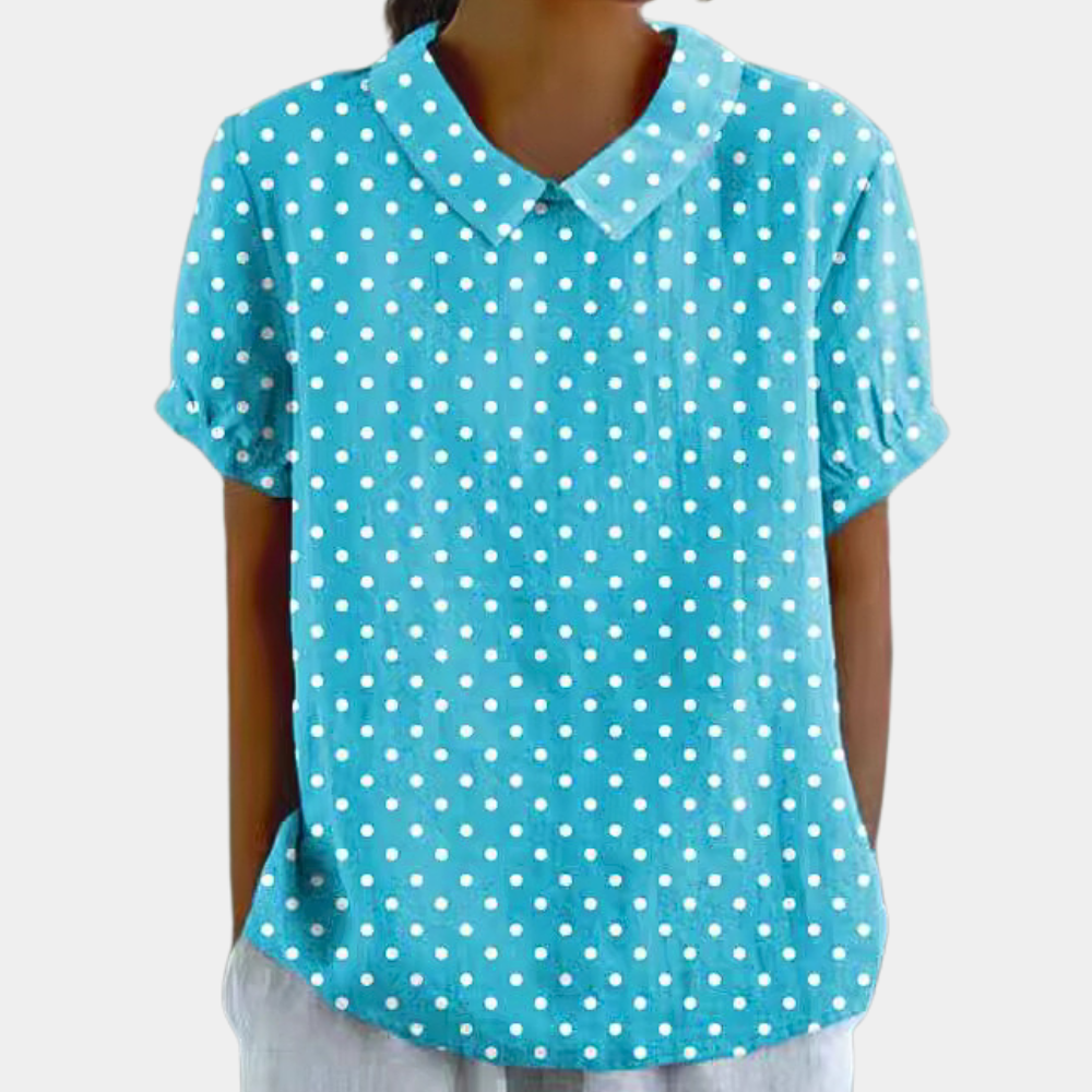 Blouse femme à fleurs pastel, col rond et manches courtes, bleu clair