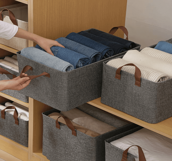 Boîte de rangement pliable pour vêtements, avec poignées