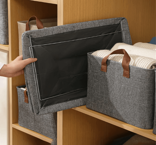 Boîte de rangement pliable pour vêtements, avec poignées