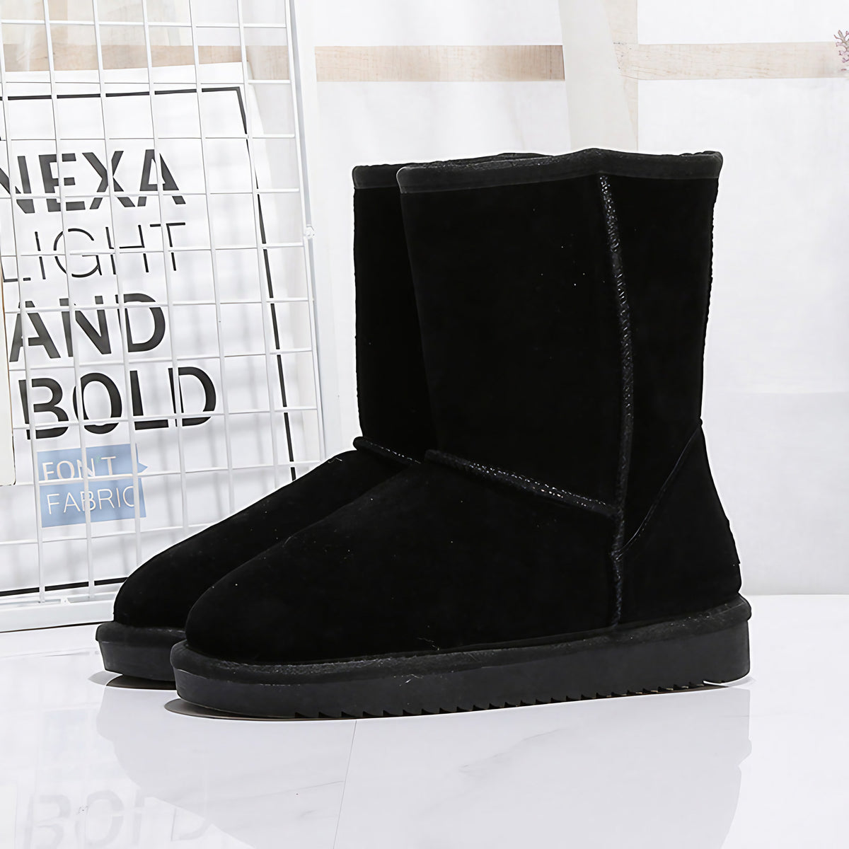 Bottes d'hiver femme mi-mollet doublées, semelle plate, neuf coloris, noir