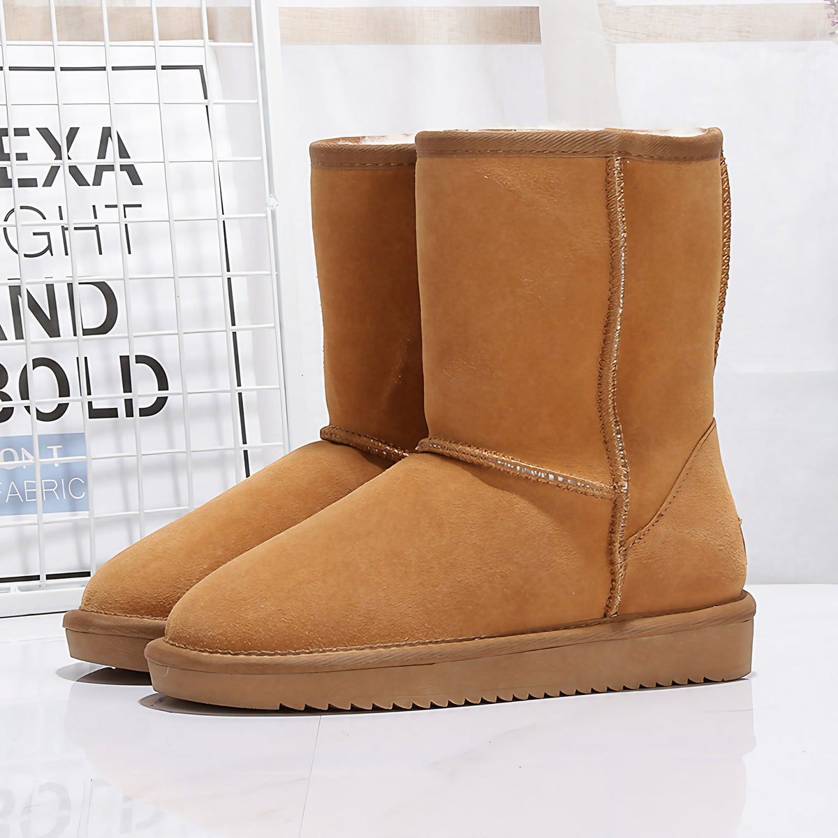 Bottes d'hiver femme mi-mollet doublées, semelle plate, neuf coloris, marron