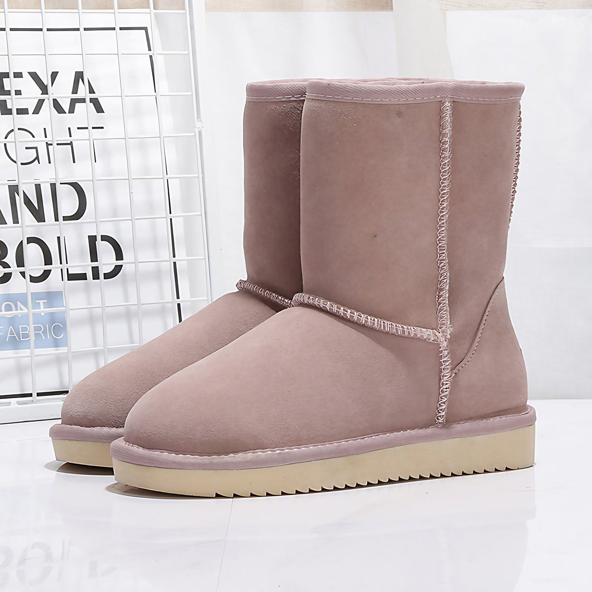 Bottes d'hiver femme mi-mollet doublées, semelle plate, neuf coloris, rose