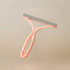 Brosse anti-poils double face pour canapé et vêtements, trois coloris, rose