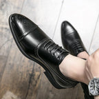 Chaussures oxford homme noires, finition lisse, détails brogue
