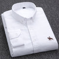 Chemise habillée femme à col structuré, poignets boutonnés, blanc