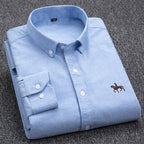 Chemise habillée femme à col structuré, poignets boutonnés, bleu