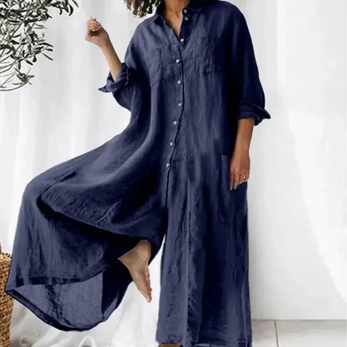 Combinaison femme boutonnée devant, jambes larges, manches longues, bleu