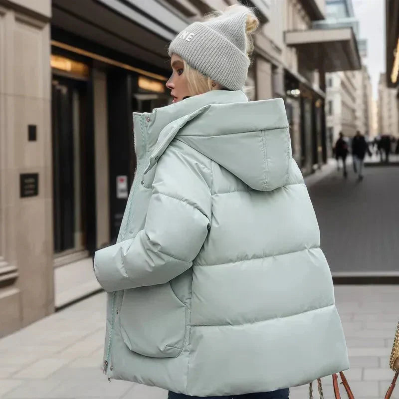 Doudoune femme oversize à capuche, col montant, poches à rabat