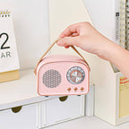 Enceinte Bluetooth rétro avec radio FM, format compact