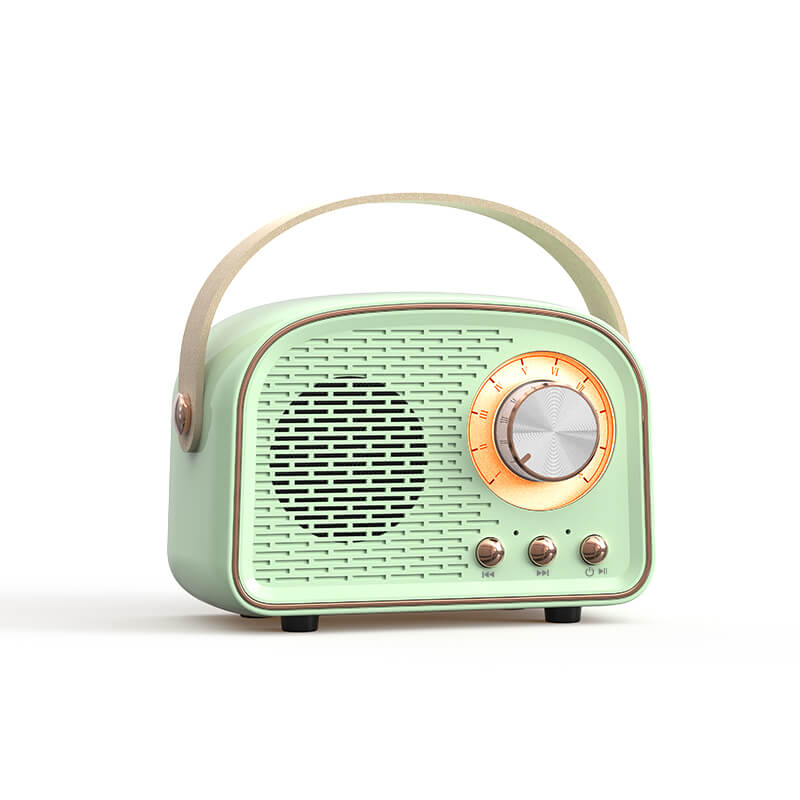 Enceinte Bluetooth rétro avec radio FM, format compact, vert clair