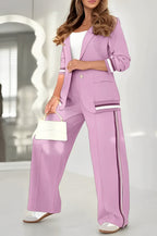 Ensemble tailleur femme blazer ajusté et pantalon large taille haute, rose
