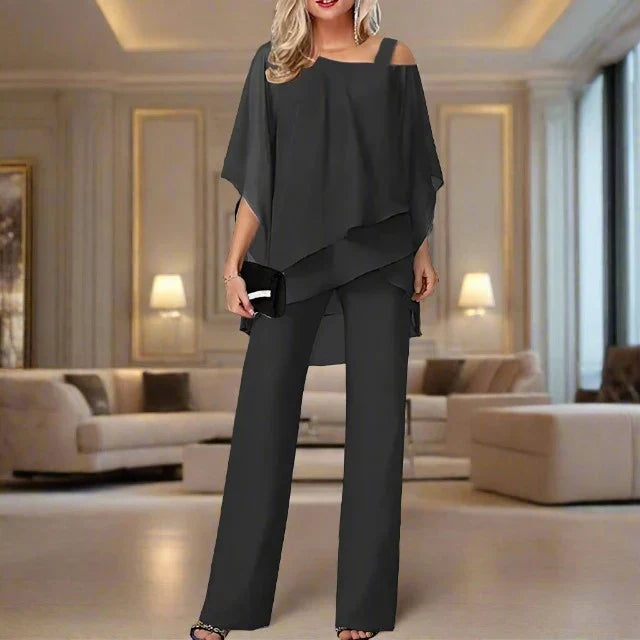 Ensemble femme combinaison pantalon et blouse à épaule asymétrique, noir