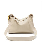 Sac besace femme en cuir grainé, sangle réglable, quatre coloris, écru