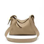 Sac besace femme en cuir grainé, sangle réglable, quatre coloris, beige