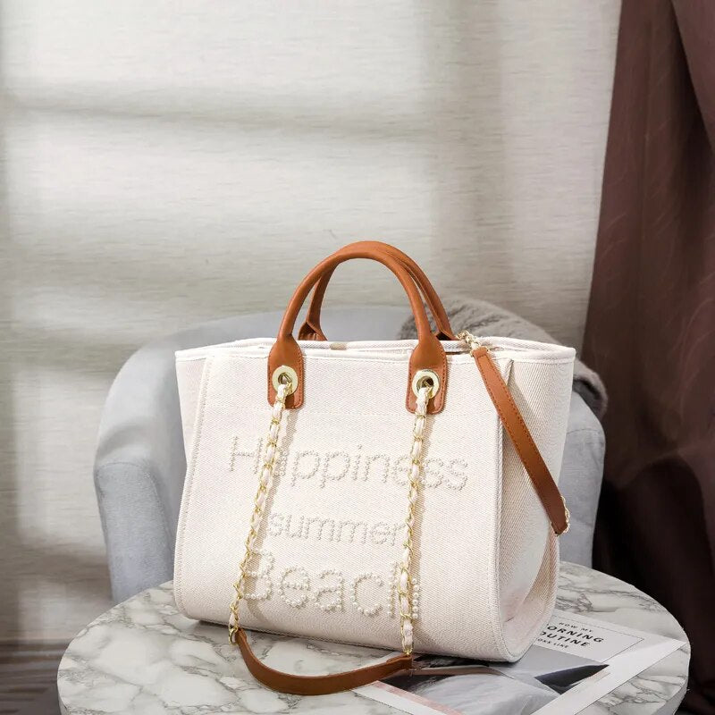 Grand sac cabas femme en toile crème, broderie de perles