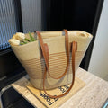 Grand panier de plage en paille doublé, anses en similicuir, beige