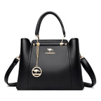 Grand sac à main femme en cuir souple, finitions dorées
