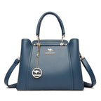 Grand sac à main femme en cuir souple, finitions dorées, bleu
