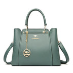 Grand sac à main femme en cuir souple, finitions dorées, vert