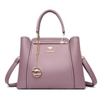 Grand sac à main femme en cuir souple, finitions dorées, pourpre