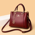 Grand sac à main femme en cuir souple, finitions dorées