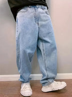 Jean baggy homme bleu clair, détail plissé, chevilles élastiquées, bleu clair