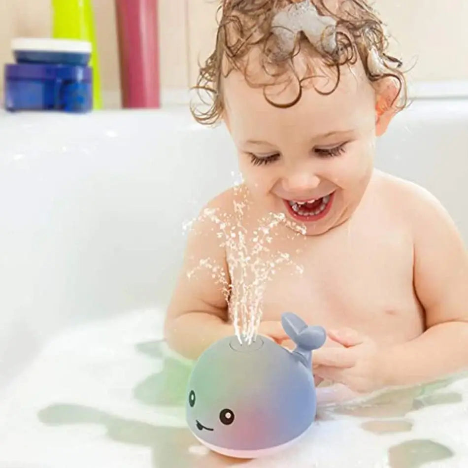 Jouet de bain baleine à jet d'eau et lumières LED