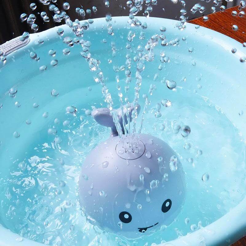 Jouet de bain baleine à jet d'eau et lumières LED