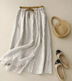 Jupe mi-longue femme trapèze taille haute, broderies et poches, blanc