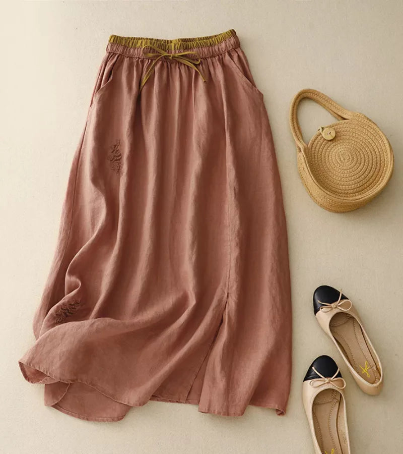 Jupe mi-longue femme trapèze taille haute, broderies et poches, rose