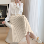 Jupe plissée mi-longue taille haute, coupe évasée, cinq coloris, blanc cassé