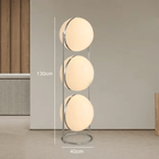 Lampadaire à boules blanches, acier brossé, une ou deux sphères