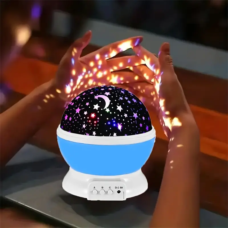 Veilleuse projecteur d'étoiles LED rotative, bleu ou rose