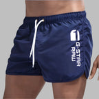 Short de bain homme uni à séchage rapide, cinq coloris, bleu marine