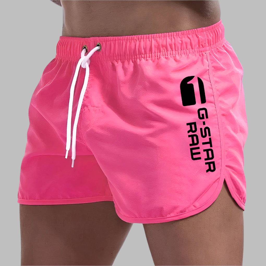 Short de bain homme uni à séchage rapide, cinq coloris, rose