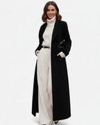 Manteau long noir femme à col à revers, coupe légèrement cintrée