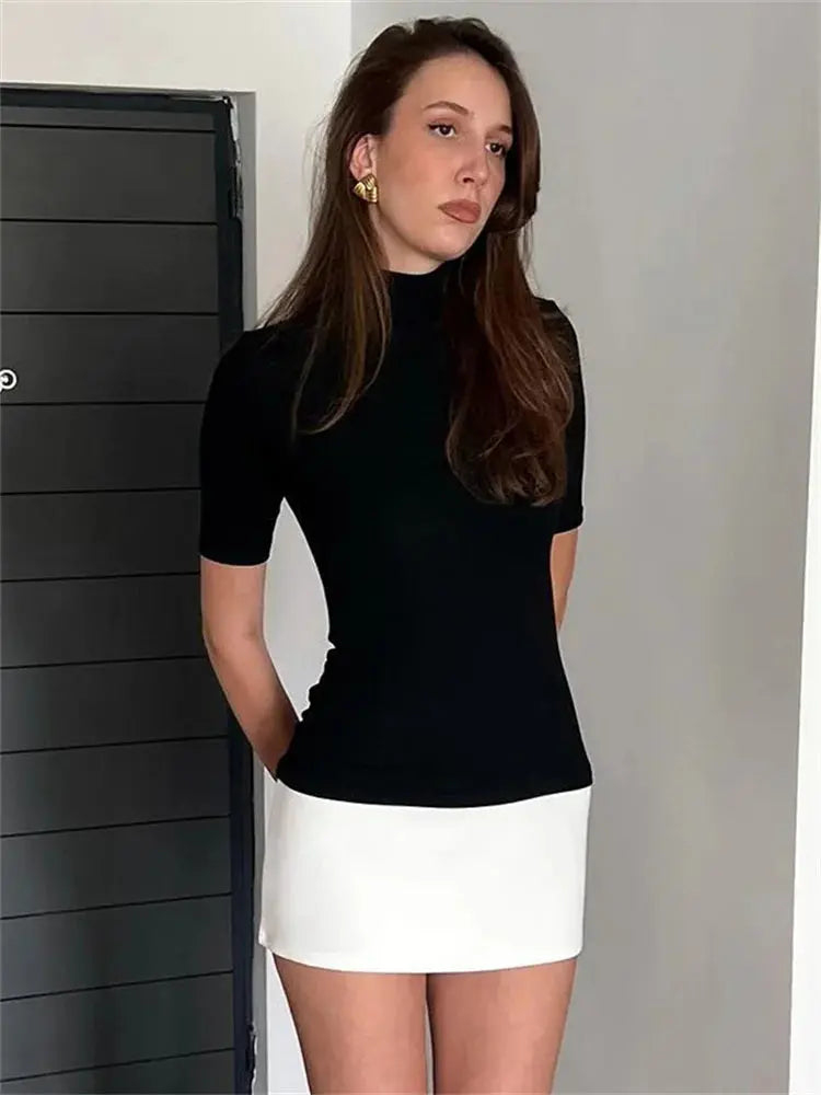 Mini robe noire ajustée femme à manches longues
