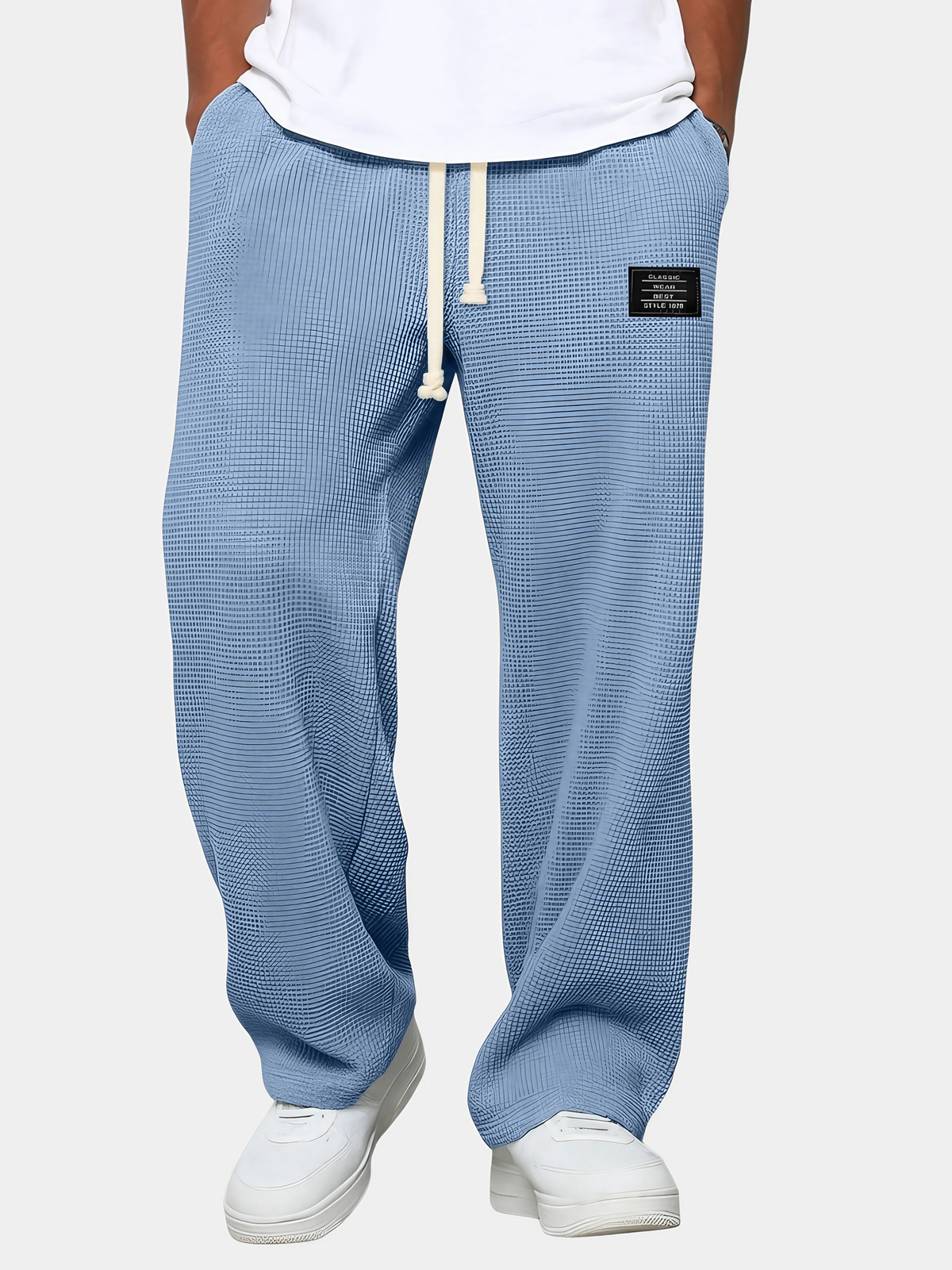 Pantalon homme texture gaufrée, coupe droite, dix coloris