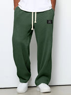 Pantalon homme texture gaufrée, coupe droite, dix coloris, vert foncé