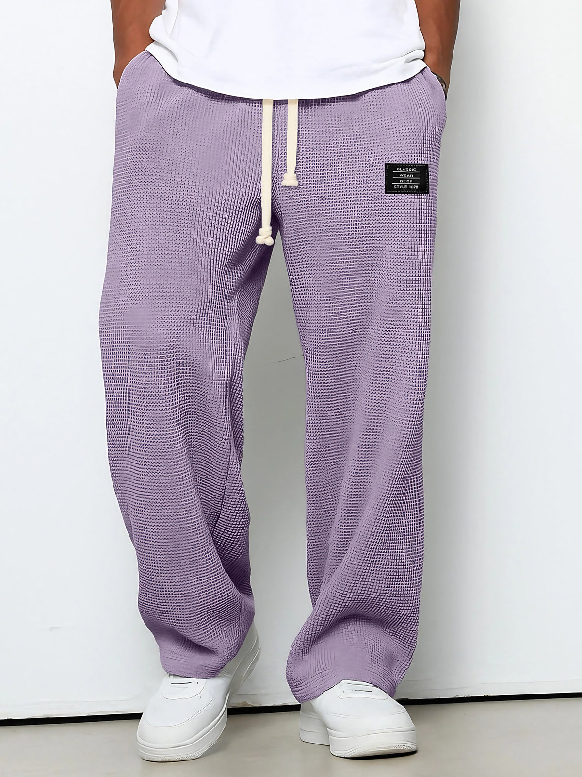 Pantalon homme texture gaufrée, coupe droite, dix coloris, violet